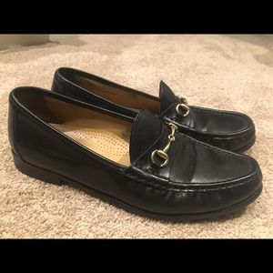 Black Cole Haan loafers w/ gold buckle
